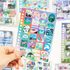 Blue journaling sticker sheet with ocean, dolphin, retro phone, computer, and bubble designs