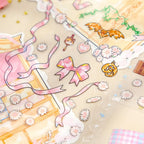 Close-up of Ornament Display Cabinet PVC stickers with pink ribbons, flowers, bows, and small decorative pieces