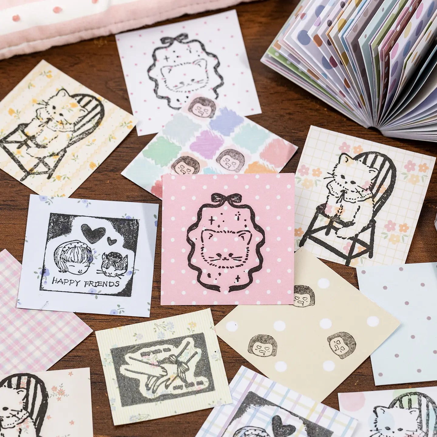 Pastel pattern paper stickers decorated with hand-drawn cats and small illustrations
