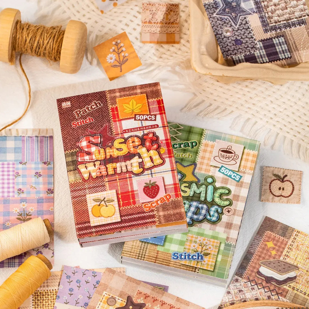 Patch Stitch journaling sticker set with Sunset Warmth and Cosmic Scraps booklets on a cozy craft desk