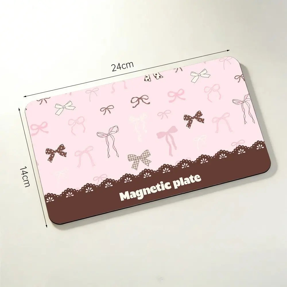Pink bow magnetic tweezer storage board with 24 by 14 cm size measurement