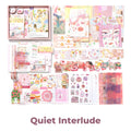 Quiet Interlude Junk Journal Kit flat lay showing the coordinated papers, ephemera, stickers, and craft embellishments included in the set