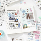 Journal pages decorated with Quiet Notes stickers, photos, speech bubbles, ribbons, and soft blue accents
