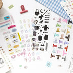 Quiet Notes Journaling Sticker Book with assorted speech bubble, icon, clip, ribbon, and decorative sticker sheets