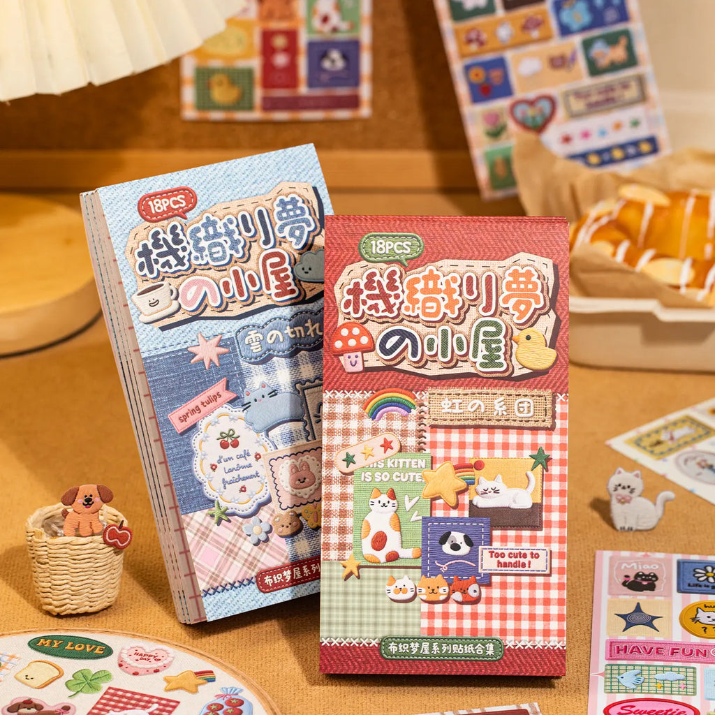 Rainbow Stitch and Cloud Stitch journaling sticker sets displayed together in red and blue packaging