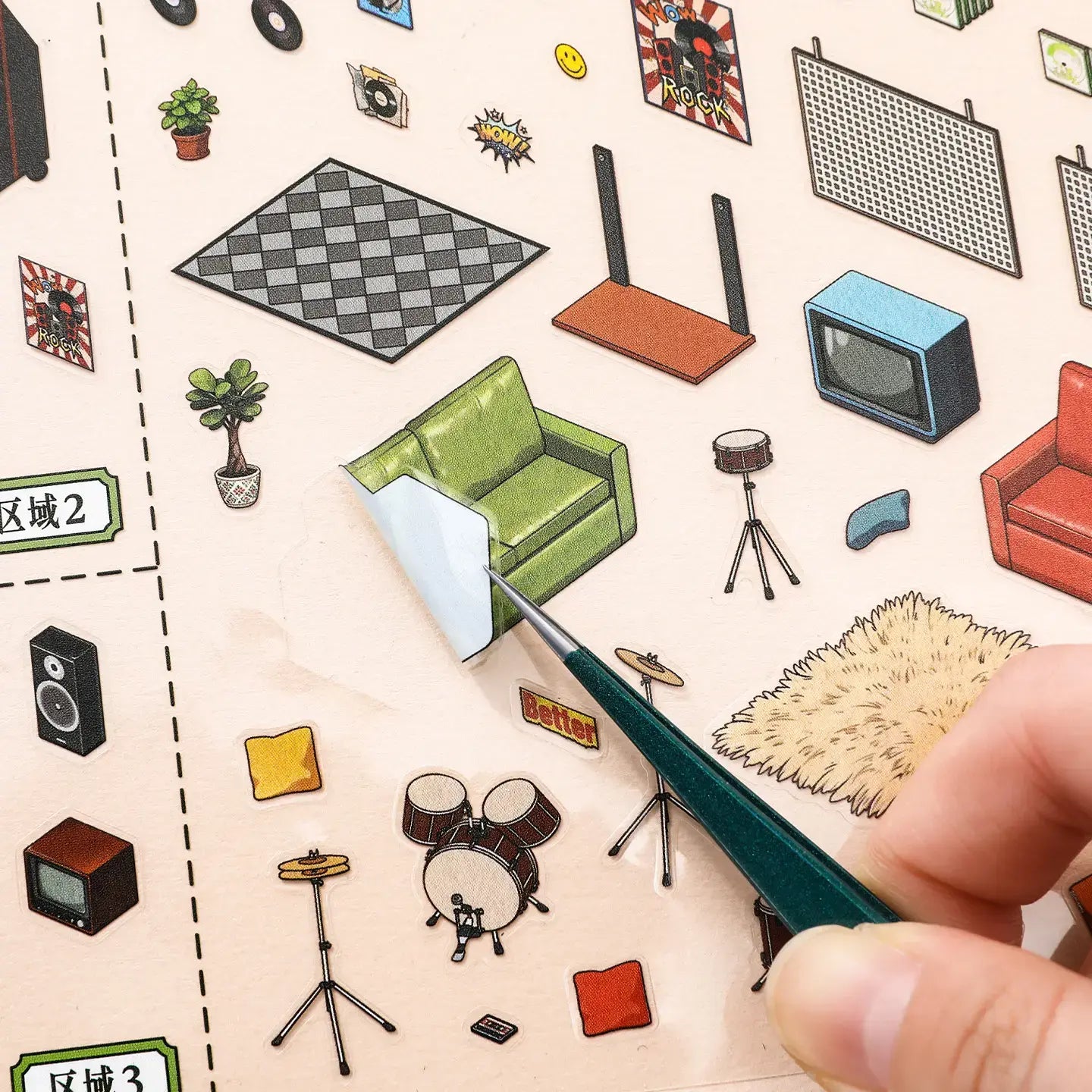 Close-up of glossy PET stickers being peeled for the Retro Record Store miniature scene kit