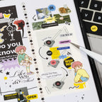Close-up of Simple Record collage stickers with text labels, arrows, stars, and character accents