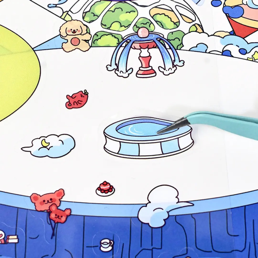 Close-up of a pool sticker piece being placed onto the Sky City scene with tweezers