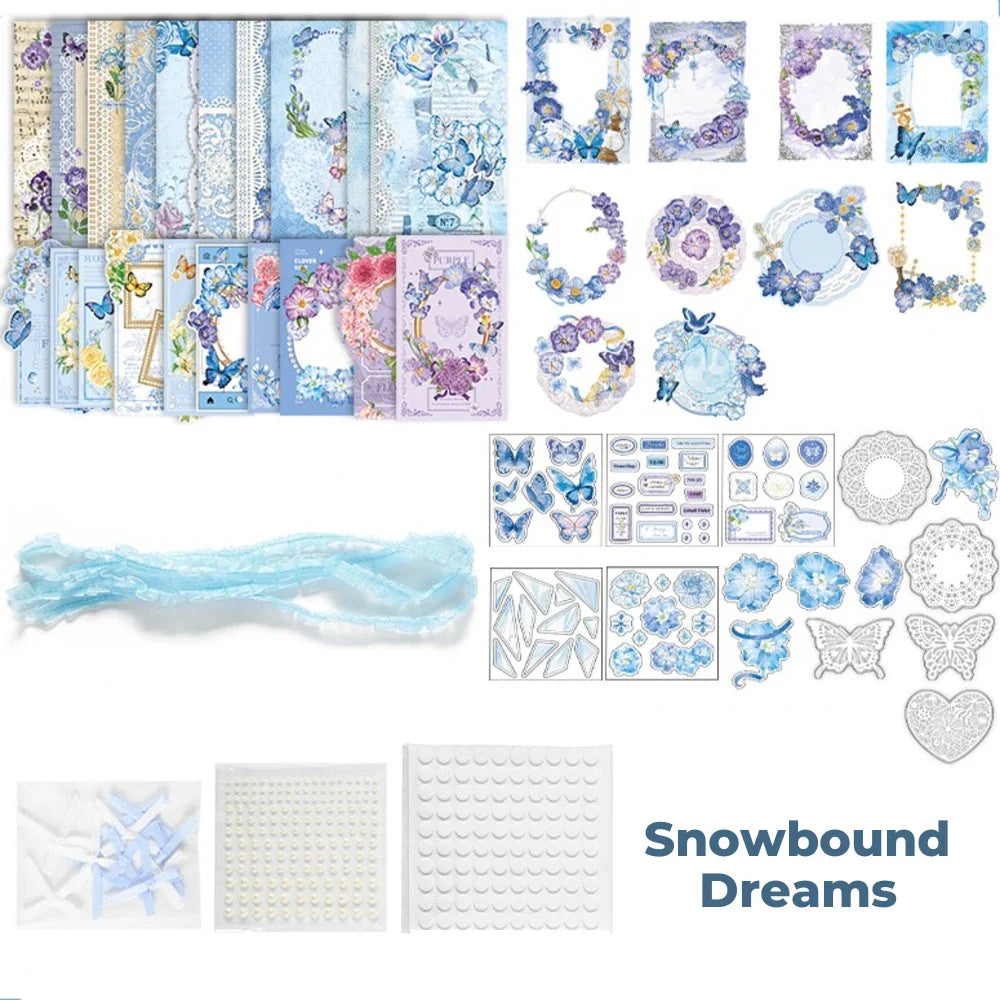 Snowbound Dreams Junk Journal Kit flat lay showing the coordinated papers, ephemera, stickers, and craft embellishments included in the set
