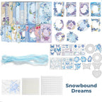 Snowbound Dreams Junk Journal Kit flat lay showing the coordinated papers, ephemera, stickers, and craft embellishments included in the set