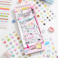Soft Scripts Journaling Sticker Book with pastel pink cover displayed among paw print, button, and decorative stickers