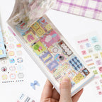Soft Scripts Journaling Sticker Book opened to pastel memo label and icon sticker pages