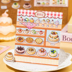 Finished cake shop scene card from Supermarket Organizer 3D Scene Sticker Book
