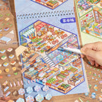 Placing stickers onto a fruit and vegetable shop scene card from Supermarket Organizer sticker book