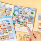 Placing stickers onto a supermarket scene card from Supermarket Organizer sticker book