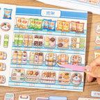 Close-up of shelf and snack stickers in the Supermarket Organizer scene sticker book