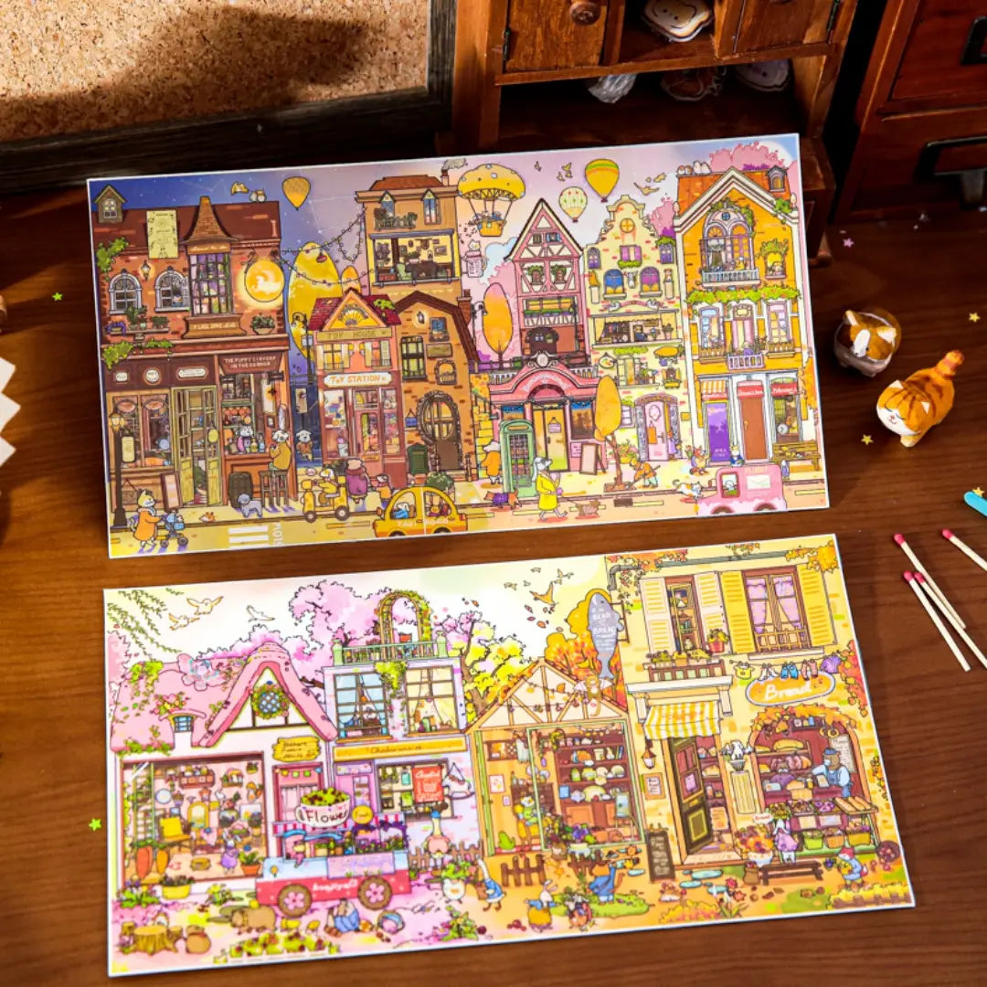 Tail Street and Gulu Town 3D scene sticker kit set with two finished miniature town scenes displayed on a wooden desk