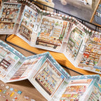 Tea Room Therapy Collage Scene Sticker Book opened to show fold-out scene displays