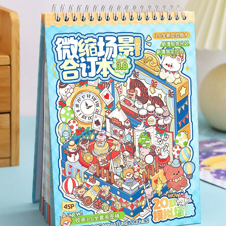 Telado 3.0 Miniature World Adventure scene sticker book standing on a desk with spiral binding and illustrated cover.
