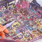 Close-up of a miniature night city scene from the Telado 7.0 Miniature City Adventure 3D scene sticker book.
