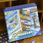 Telado 8.0 Mini Market Adventure scene sticker book standing on a shelf with small shop stickers nearby.