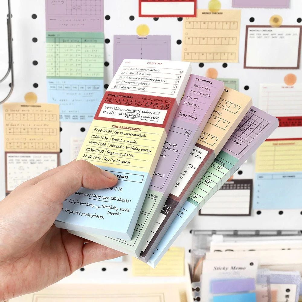 Vintage Planner memo pad assortment showing four functional layouts for study planning and journaling.