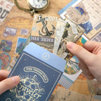Warm Postal Journey Junk Journal Kit ephemera card details with travel labels, tickets, and decorative paper accents
