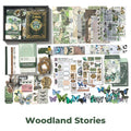 Woodland Stories Junk Journal Kit flat lay showing the coordinated papers, ephemera, stickers, and craft embellishments included in the set