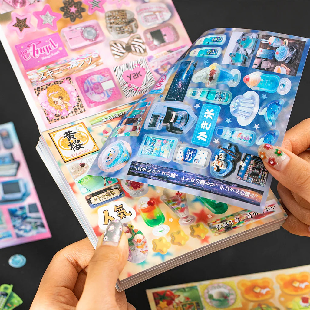 Flip-through view of Y2K retro tech and gadgets sticker book set pages with drinks, desserts, and digital designs