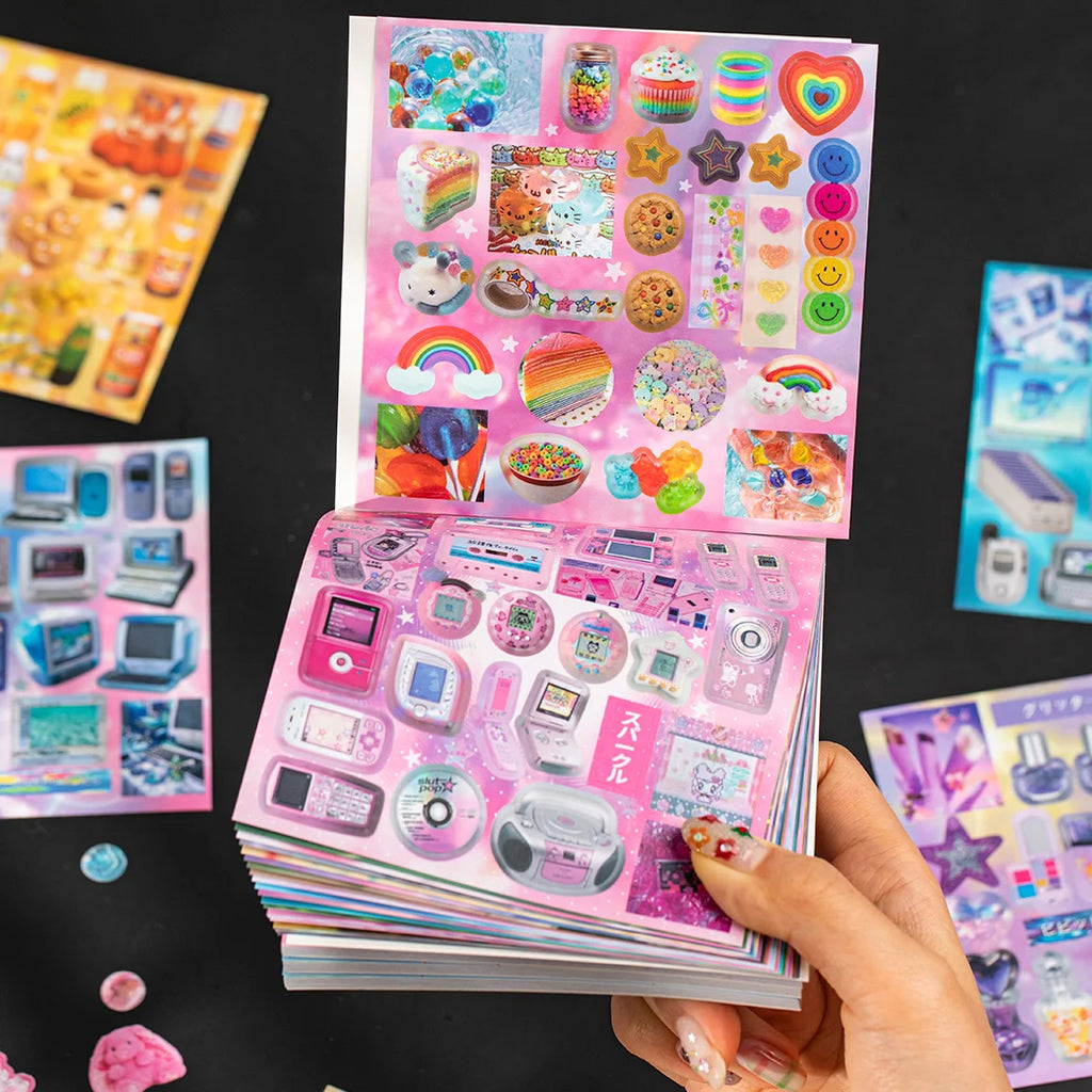 Stack of Y2K retro tech and gadgets journaling sticker book sheets with cute rainbow and device designs